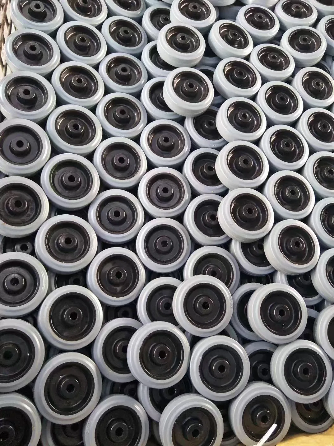 Rubber solid tires with plastic wheel cores for scooters, AGV and AMR