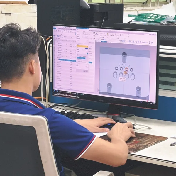 Engineer reviewing a component drawing