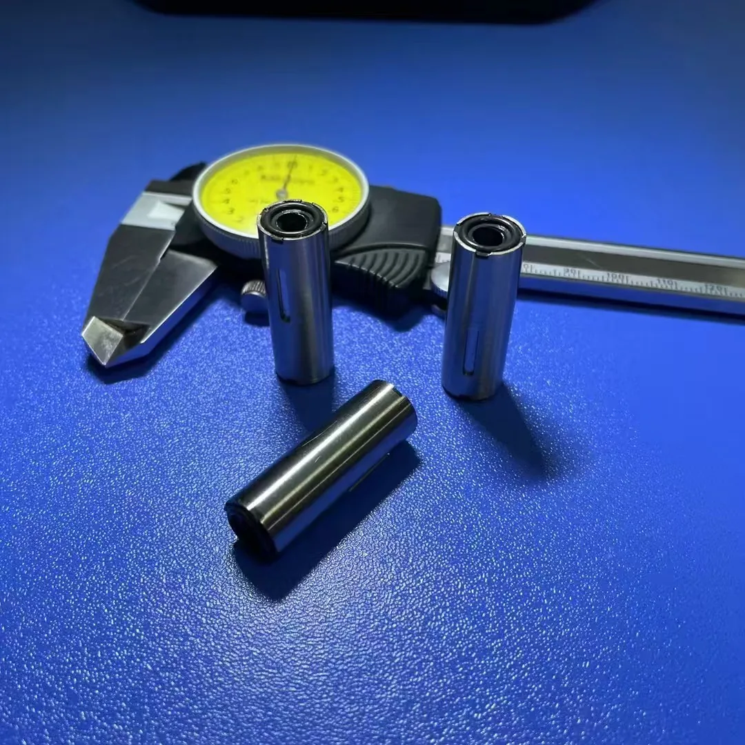 Precision FFKM screw-valve components inspected with a dial caliper